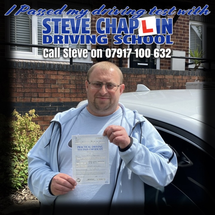 John Blanchard passing his driving test after automatic driving lessons in Eastwood, Nottinghamshire.