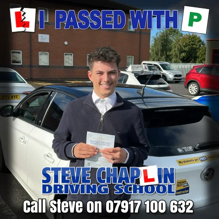 Lewis Newton holding his driving test pass certificate after automatic driving lessons in Ilkeston.