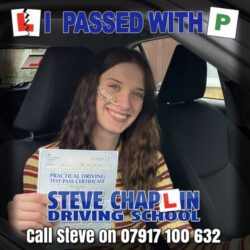 Celebrating Lauren Mason's driving test success at Chilwell Test Centre. Lauren Mason passing her driving test after taking automatic driving lessons in Nuthall with Steve Chaplin Driving School.