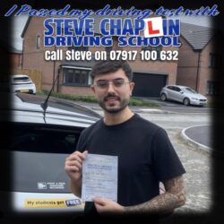 Celebrating Arif Arikan's driving test success at Chilwell Test Centre. Arif Arikan passing his driving test after taking automatic driving lessons in Shipley, Derbyshire with Steve Chaplin Driving School.